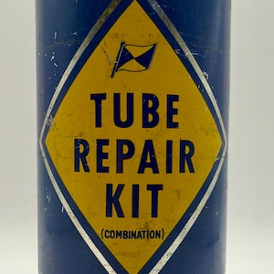 Vintage  Good year tube repair kit with contents. advertising