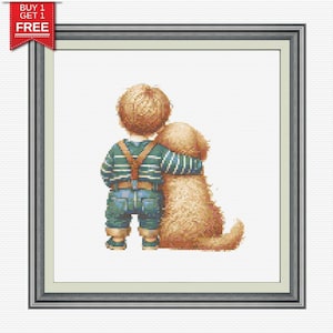 Op de afbeelding: Kruissteekkunstwerk dat een kind en een hond omarmd afbeeldt. De persoon draagt een gestreept shirt, een blauwe overall en bretels. De hond heeft lichtbruine vacht. Het kunstwerk is ingelijst en bevat een banner "KOOP 1 KRIJG 1 GRATIS".