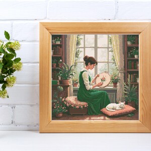 girl embroidering by window cross stitch pattern, cozy room with cat and plants, peaceful handmade home scene