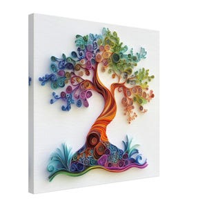 May include: A colourful paper quilling artwork featuring a tree with a rainbow-coloured trunk and branches. The tree is surrounded by green grass and flowers.