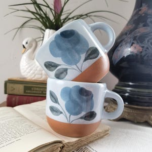 2 antique stoneware teacups, coffee cups, blue rose pattern, circa 1960