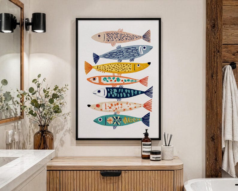 May include: A framed art print featuring six stylized fish in various colors. The fish are arranged vertically against a white background. Each fish has unique patterns and colors, including blue, yellow, and orange. The frame is black.
