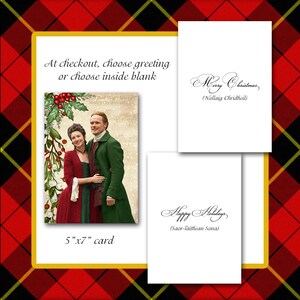 May include: A 5"x7" greeting card featuring a couple in period attire, with text that reads "Merry Christmas" and "Happy Holidays". The card has a white background with a gold border, set against a red and black plaid pattern.