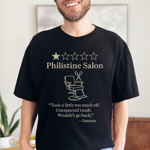 Philistine Salon Funny Bible Shirt, Samson Haircut Christian Tee, Reformed Humor Shirt, Comfort Colors Unisex Tee Black