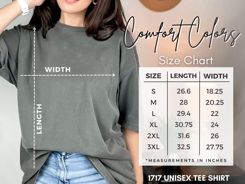 May include: A gray unisex tee shirt with a size chart showing measurements in inches. The chart lists sizes S through 3XL, with lengths from 26.6 to 32.5 inches and widths from 18.25 to 27.75 inches. The shirt is labeled "1717 UNISEX TEE SHIRT."