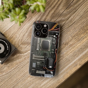 May include: A clear phone case with a printed image of a computer motherboard. The case has a cutout for the phone's camera lenses.