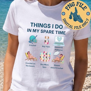 May include: A white t-shirt featuring the text "THINGS I DO IN MY SPARE TIME" and six illustrations depicting crochet-related activities: crochet, buying yarn, researching patterns, crocheting on the beach, buying more yarn, and dreaming about crochet.