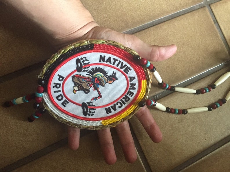 Native Pride medallion with sweetgrass border authentic Native American Beadwork