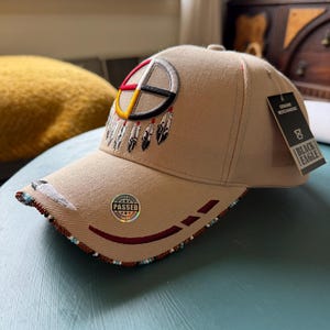 Beaded native pride hat by American Indian Artist