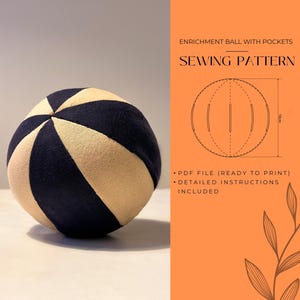 May include: A navy blue and tan enrichment ball with pockets. The ball is made of fabric and has a segmented design. The image also includes a sewing pattern diagram and text that reads "Enrichment Ball with Pockets Sewing Pattern."
