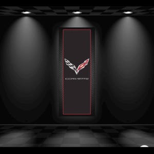 May include: A black and red Corvette logo displayed on a black background. The logo features a checkered flag and a red emblem. The word "CORVETTE" is written below the logo in white. The background is a dark room with spotlights.