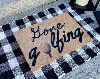 Felpudo con la frase "Me fui a jugar al golf"