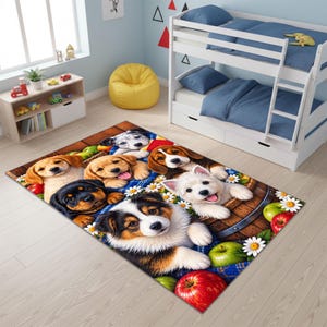 May include: A rectangular area rug featuring a vibrant graphic print of multiple puppies of various breeds, including a golden retriever, beagle, and West Highland white terrier, interspersed with red and green apples and white daisy flowers.