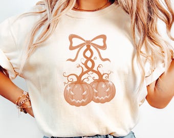 Cute Halloween Shirt, Pumpkin Coquette Bow Tee, Spooky Season Shirt, Gift for Halloween Fans, Halloween Spirit Tee, Gift for Pumpkin Lover