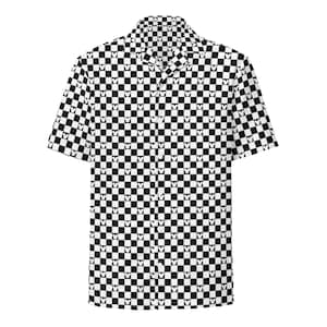 May include: A short-sleeved button-down shirt with a black and white checkered pattern. The pattern includes small Mickey Mouse head silhouettes within each square. The shirt has a classic collar and a relaxed fit, suitable for casual wear.