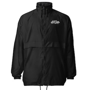 May include: A black lightweight jacket with a zipper closure and a small white graphic on the front. The graphic depicts a group of people standing in a line.