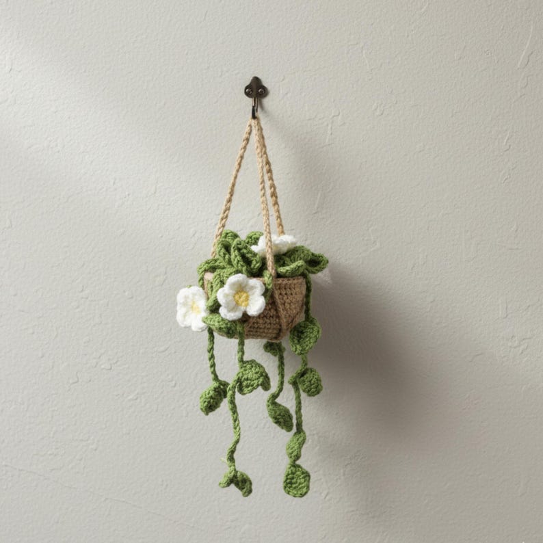 Crochet pot with yellow flowers and green vines handmade