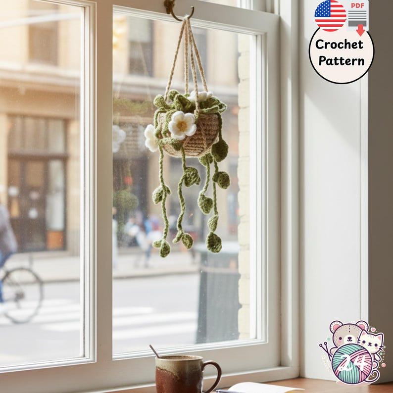 Crochet charm mini potted plant with green leaves on a window handmade decor