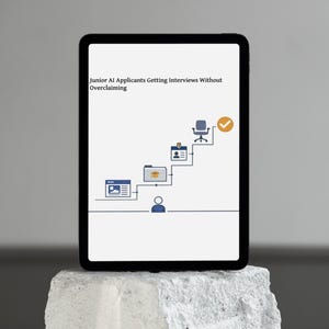 May include: A tablet displaying the text Junior AI Applicants Getting Interviews Without Overclaiming above a graphic showing a step-by-step process with icons for a website, a folder, an ID badge, an office chair, and a checkmark.