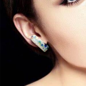 One-of-a-kind asymmetrical ceramic stud earrings