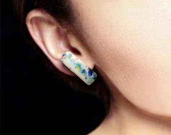 One-of-a-kind asymmetrical ceramic stud earrings