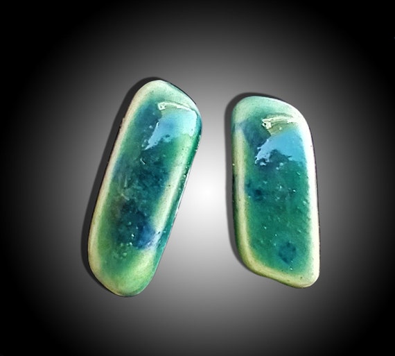One-of-a-kind asymmetrical ceramic stud earrings