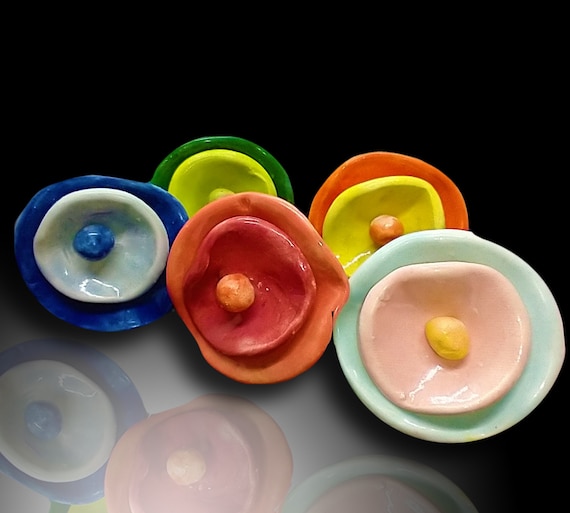 One-of-a-kind Happy people rings
