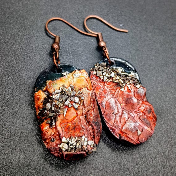 One-of-a-kind organic distressed to copper-colored and black earrings