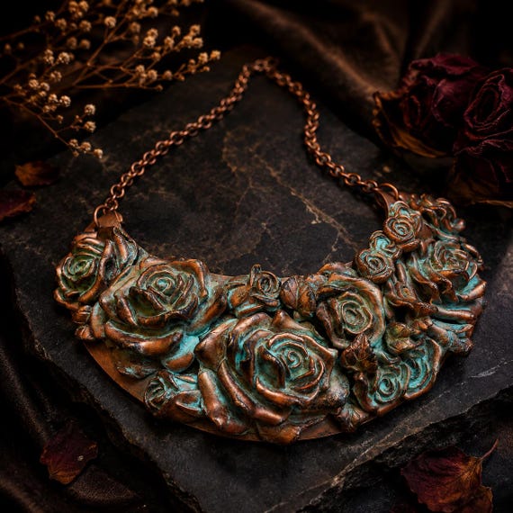 Distressed copper rose bouquet bib necklace