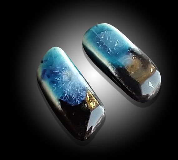 One-of-a-kind asymmetrical ceramic stud earrings