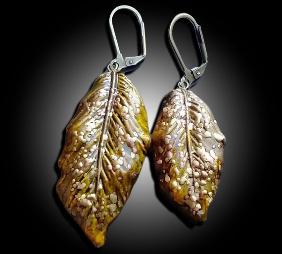 One-of-a-kind asymmetrical leaves polymer clay earrings studs