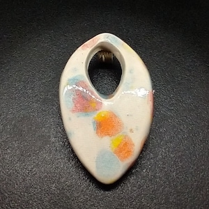 One-of-a-kind blue ink spotted ceramic pendant