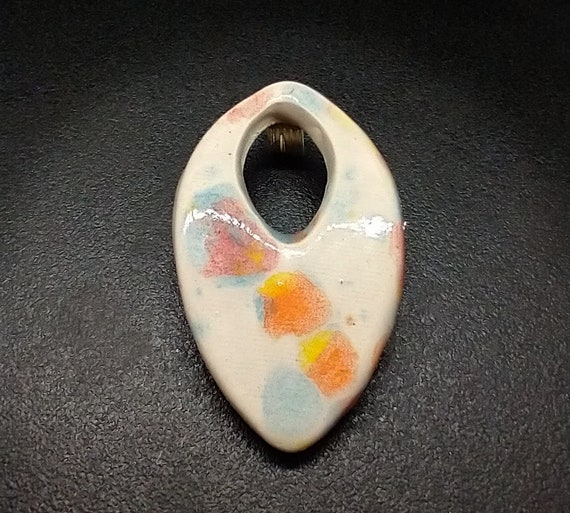 One-of-a-kind blue ink spotted ceramic pendant