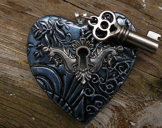 The key to my heart pendant in oxidized silver