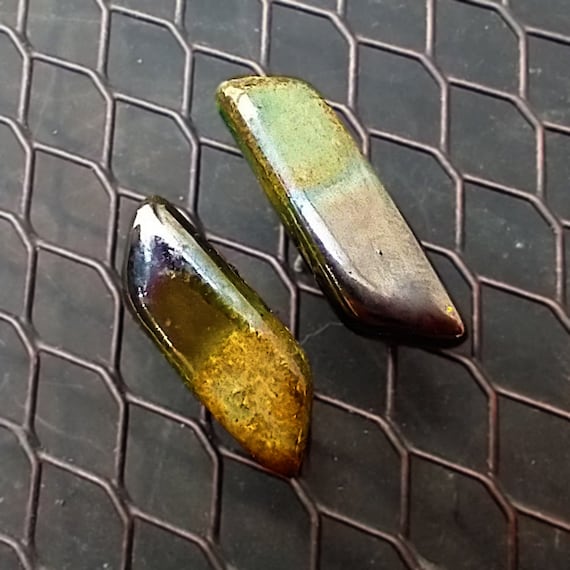 One-of-a-kind asymmetrical ceramic stud earrings