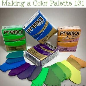 May include: An assortment of Premo! Sculpey polymer clay in various colors, including green, blue, purple, and yellow. The image includes blocks of clay and color swatches, with the text "Polymer Clay Color Theory: Making a Color Palette 101".