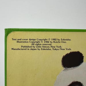 May include: A book cover with a green border and a yellow background. The text reads "Text and cover design Copyright &copy; 1982 by Zokeisha. Illustration Copyright &copy; 1982 by Koichi Ono. All rights reserved. Published by Little Simon/New York. Manufactured in Japan by Zokeisha, Tokyo/New York."