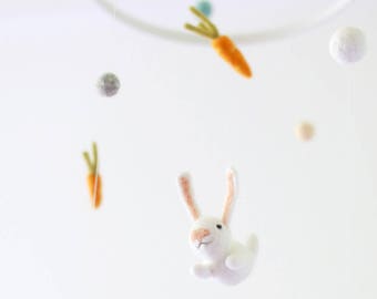 Baby mobile with bunnies and white frame