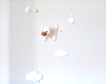 Pastel baby crib mobile with a bear, nursery mobile