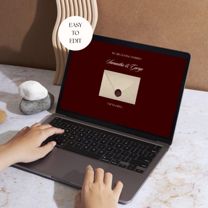 May include: A laptop screen showing a wedding invitation design with the text "We are getting married" and the names "Samantha & George." The invitation features an envelope graphic with a wax seal. The laptop screen is a deep red colour. The words "Easy to Edit" are in a white circle.