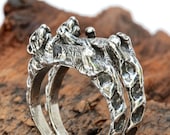 Otters holding hands rings  set of two  Sterling silver Blue Bayer Design NYC