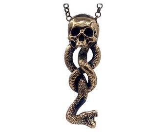 The Large Bronze Mark of the Dark skull snake necklace made in NYC