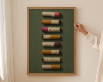 May include: A framed artwork featuring seven stylized cigarette sculptures. Each cigarette has a tan paper body and a colored tip, including pink, purple, and gold. The background is a dark green, and the frame is a light brown.