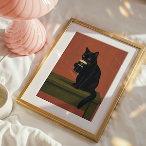 Puede incluir: L&aacute;mina enmarcada que muestra un gato negro bebiendo una pinta de Guinness. El gato est&aacute; posado sobre una superficie verde, con un fondo marr&oacute;n rojizo. La impresi&oacute;n est&aacute; en un marco dorado con un paspart&uacute; blanco.