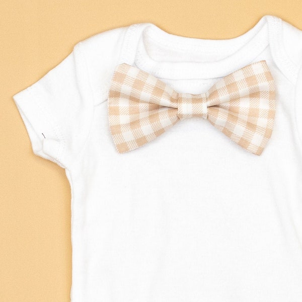 Baby bodysuit with bow tie clearance
