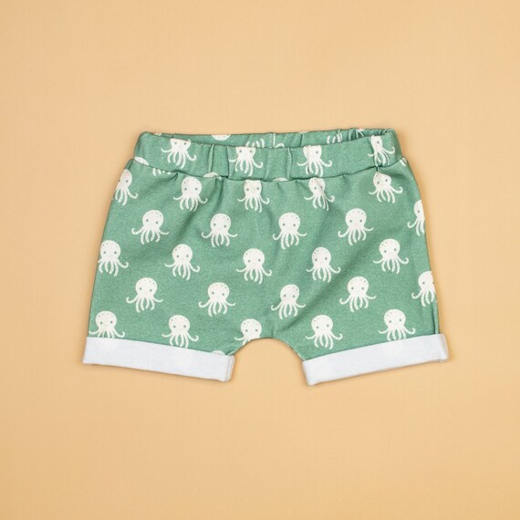 green baby shorts