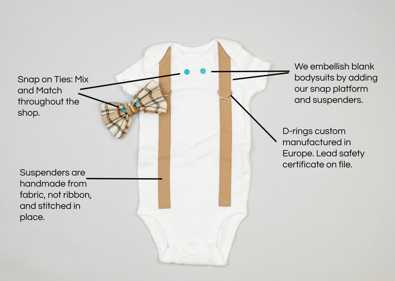 May include: A white bodysuit with tan suspenders and a plaid bow tie. The suspenders have D-rings and the bow tie has turquoise blue accents. The text "Snap on Ties: Mix and Match throughout the shop." is visible in the image.