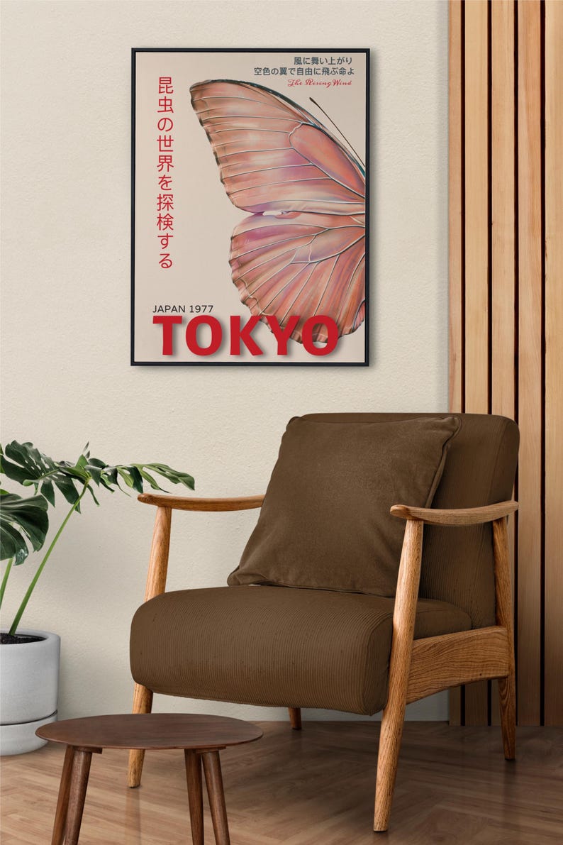 May include: A vintage poster with a butterfly illustration and the text "昆虫の世界を探検する" (Explore the world of insects) in Japanese. The poster also includes the text "風に舞い上がり" (Soaring on the wind) and "空色の翼で自由に飛ぶ命よ" (Life flies freely on azure wings). The poster is framed in black and has the text "JAPAN 1977 TOKYO" at the bottom.