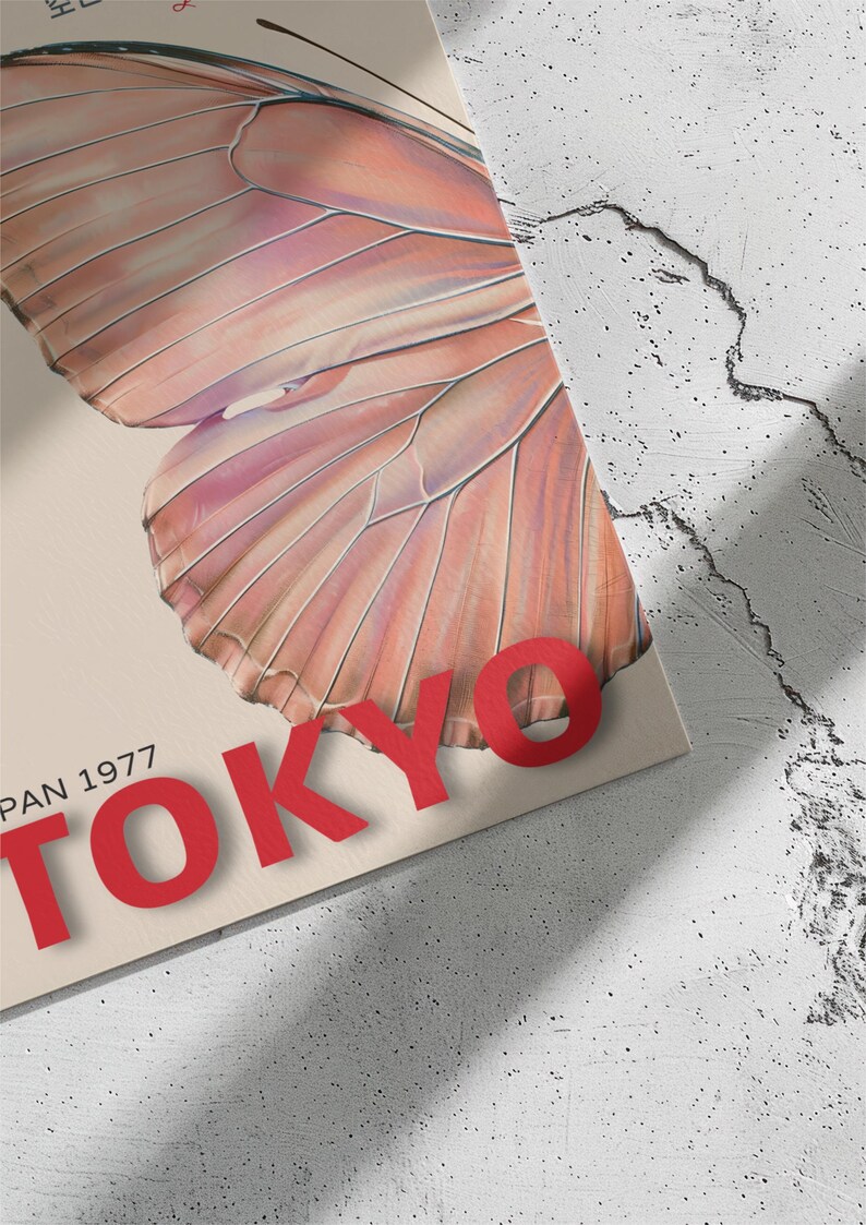 May include: A vintage poster with a pink butterfly and the text "TOKYO" in red letters. The poster also includes the text "PAN 1977".