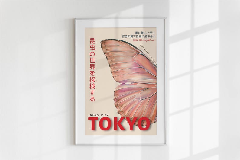 May include: A vintage poster with a butterfly wing design in shades of pink and white. The poster has Japanese text that reads "昆虫の世界を探検する" and "JAPAN 1977 TOKYO".